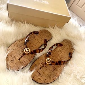 Michael Kors Tortoise shell flip flops